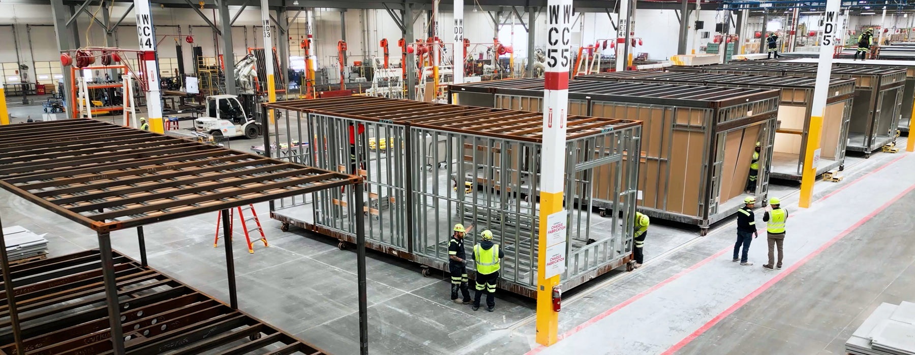 Group of people working in a factory